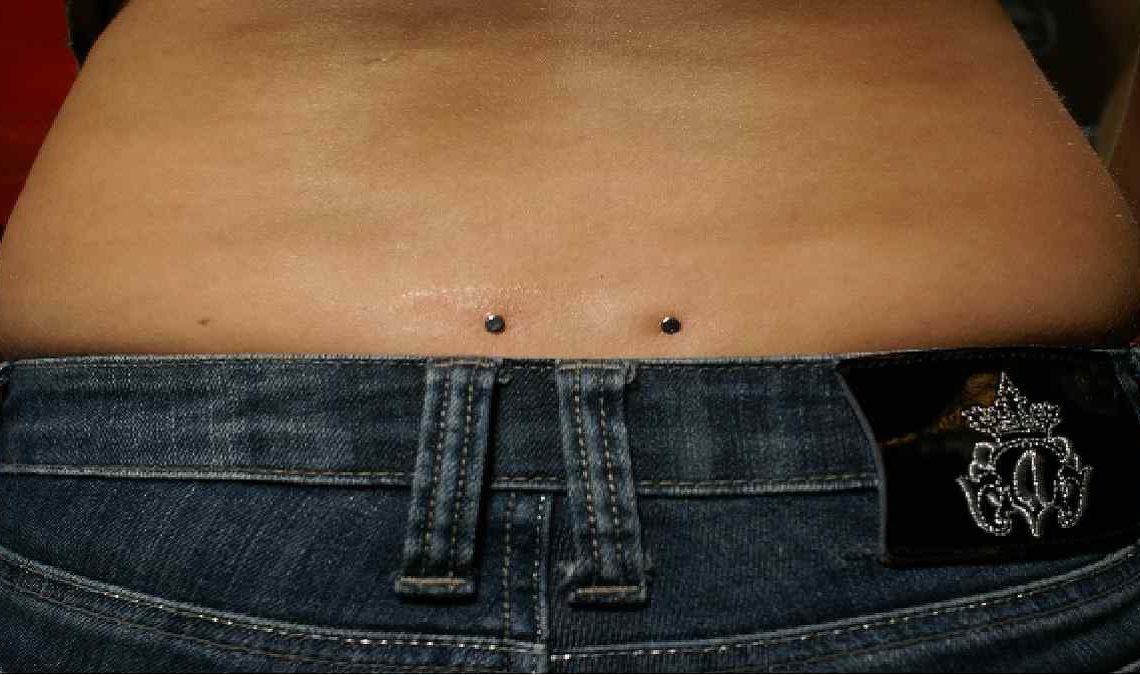 Lower Back Piercings